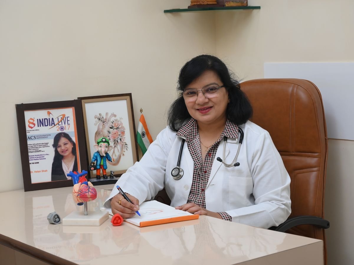 Dr. Hetan Shah at her desk in the clinic